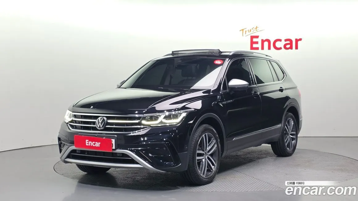Volkswagen Tiguan — фото 1
