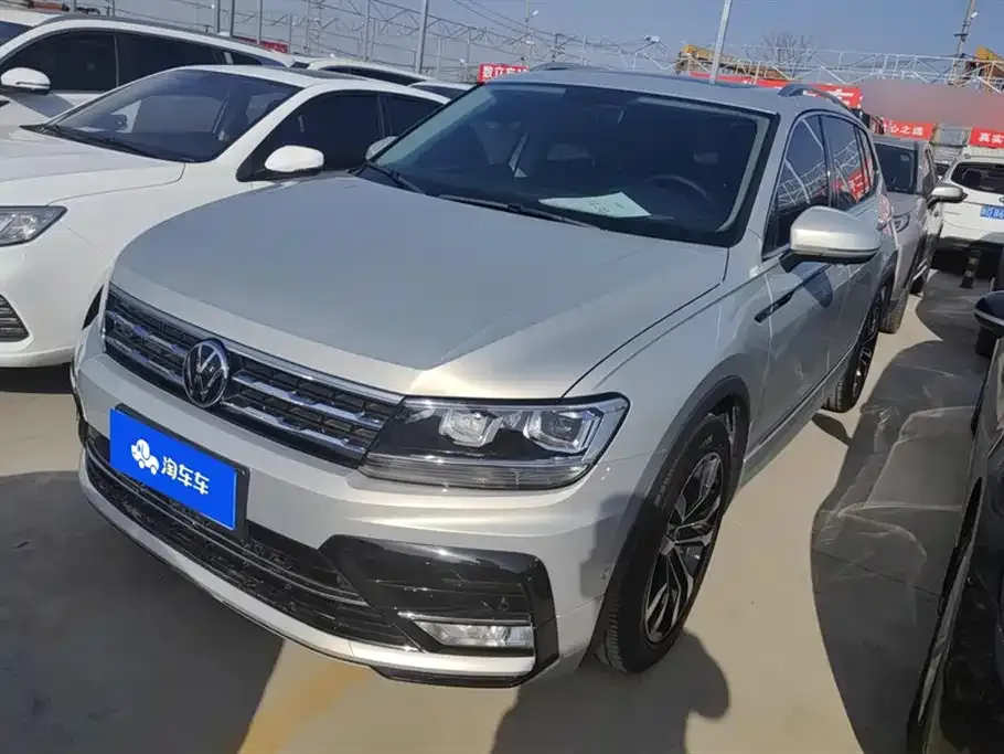 Volkswagen Tiguan L — фото 1