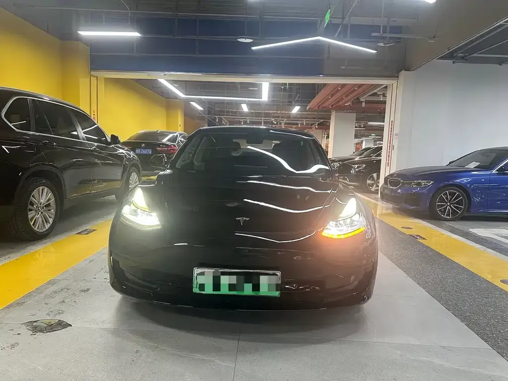 Tesla Model 3 — фото 4