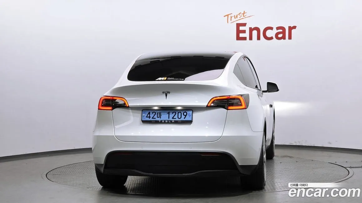 Tesla Model Y — фото 7