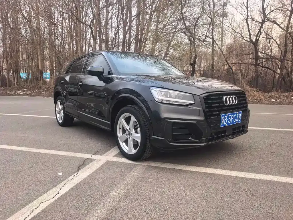 Audi Q2L — фото 10