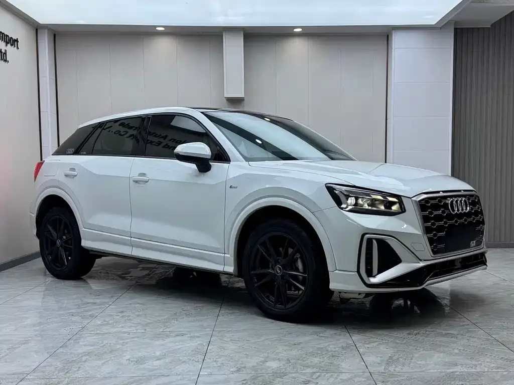 Audi Q2L — фото 8