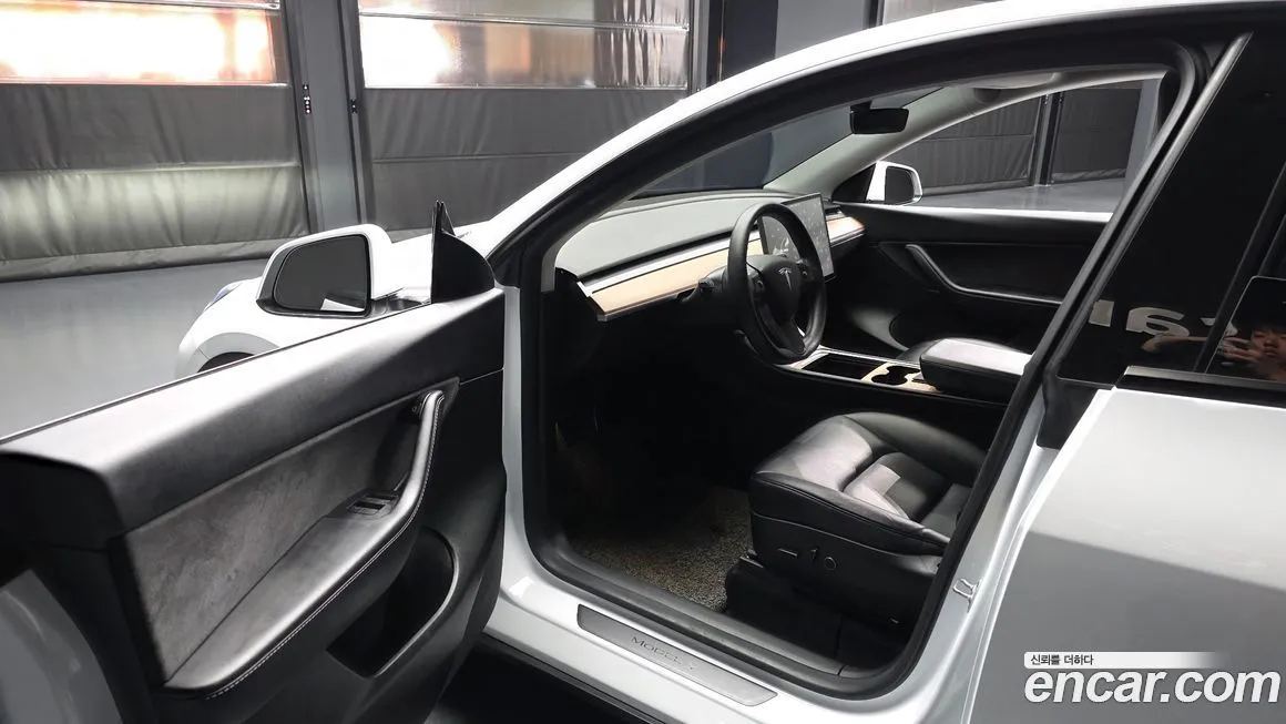 Tesla Model Y — фото 6