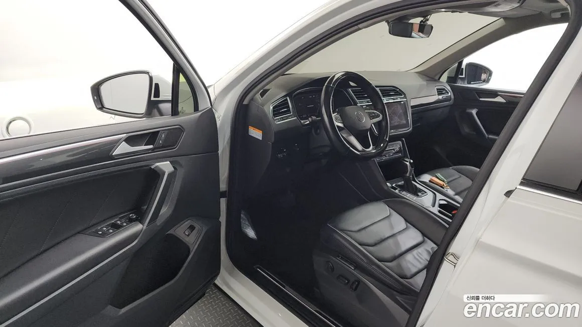 Volkswagen Tiguan — фото 9
