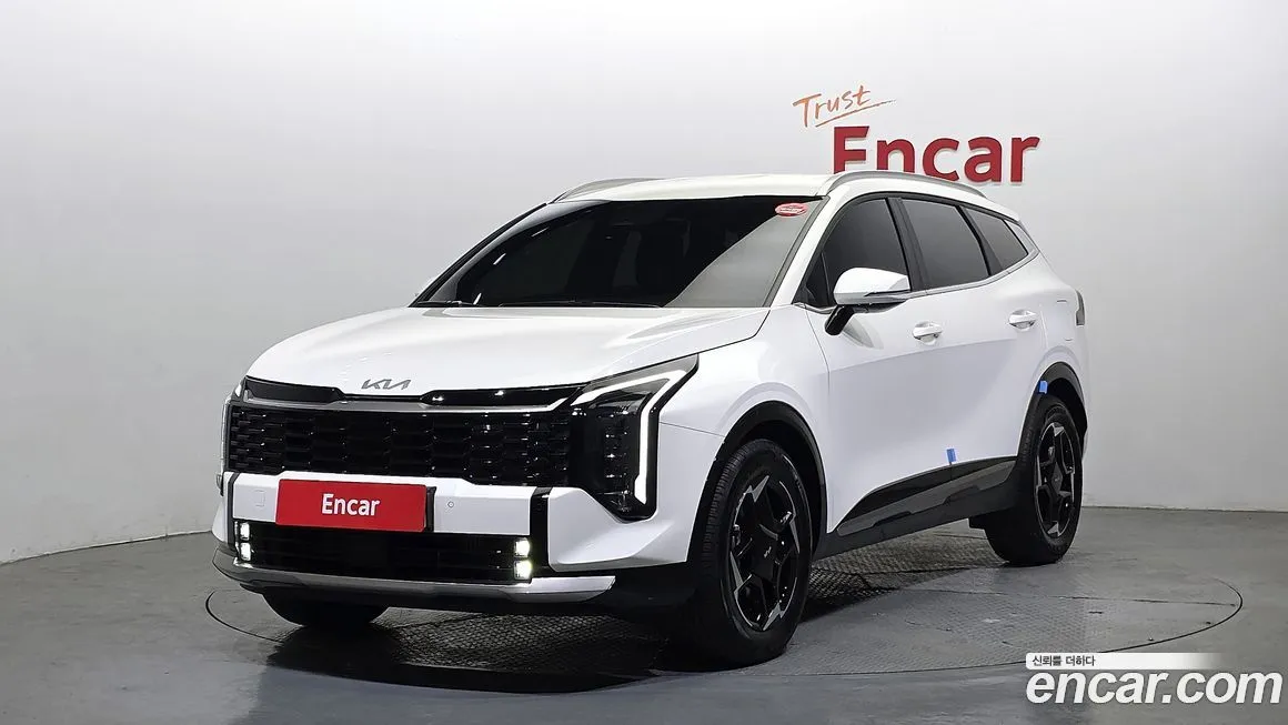 Kia Sportage — фото 1