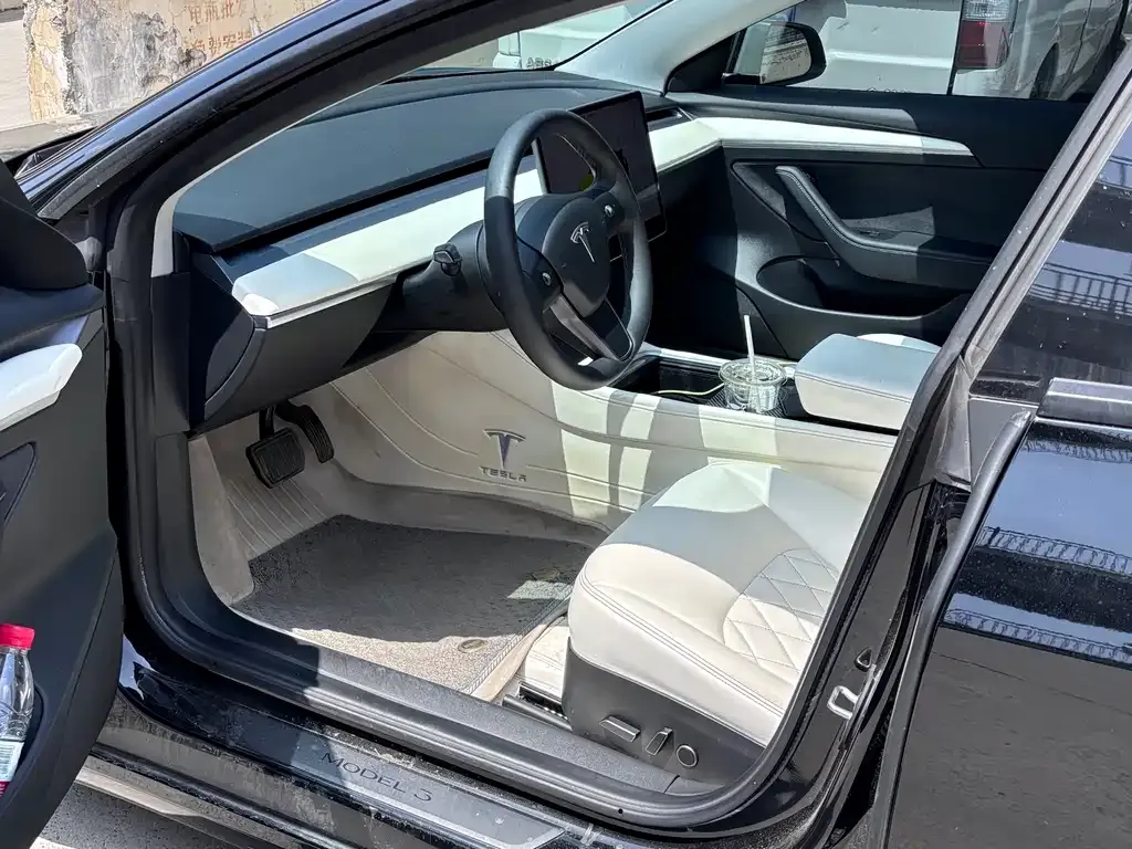 Tesla Model 3 — фото 7
