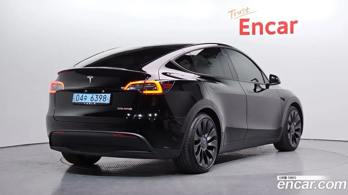 Tesla Model Y — фото 6