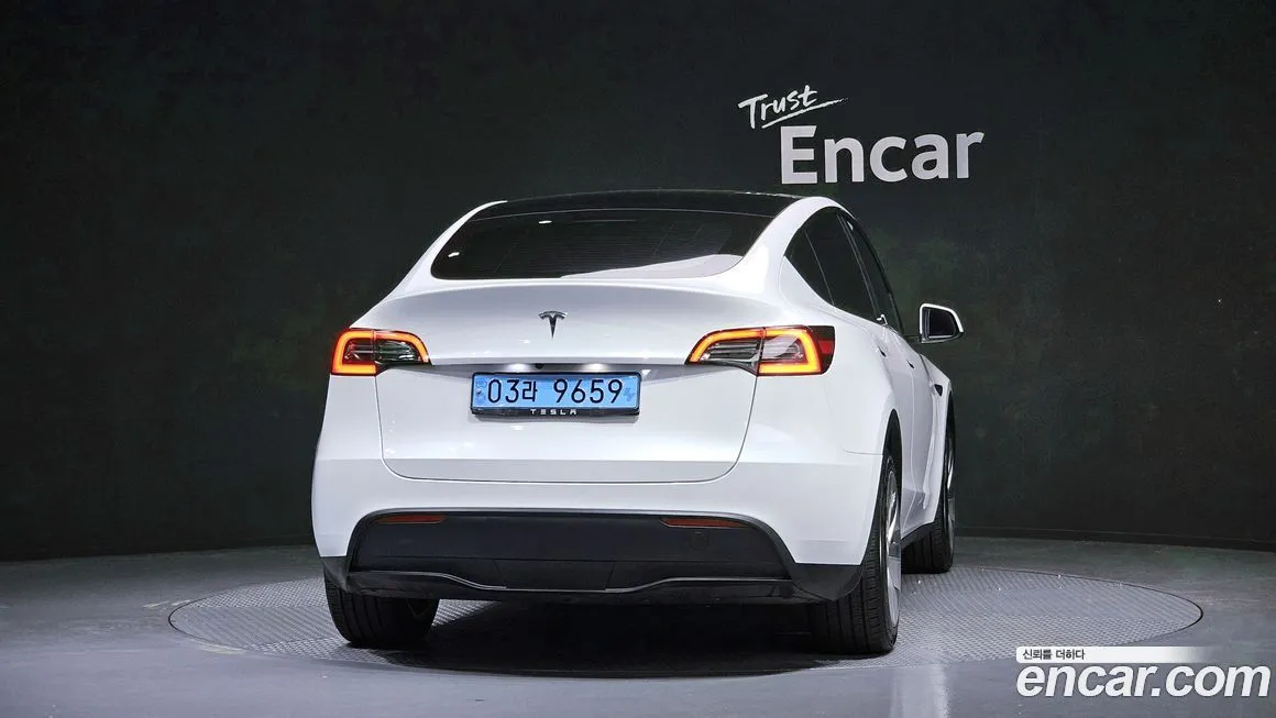 Tesla Model Y — фото 7