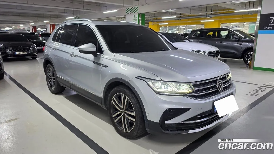 Volkswagen Tiguan — фото 1