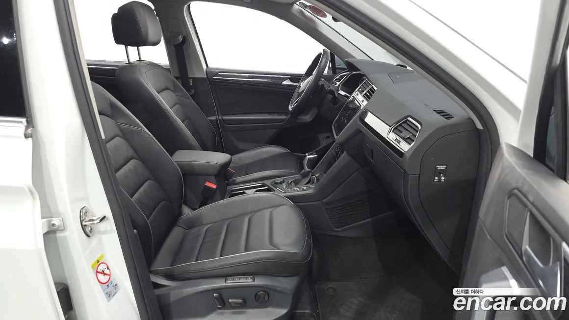 Volkswagen Tiguan — фото 10