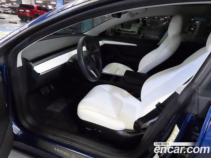 Tesla Model 3 — фото 10