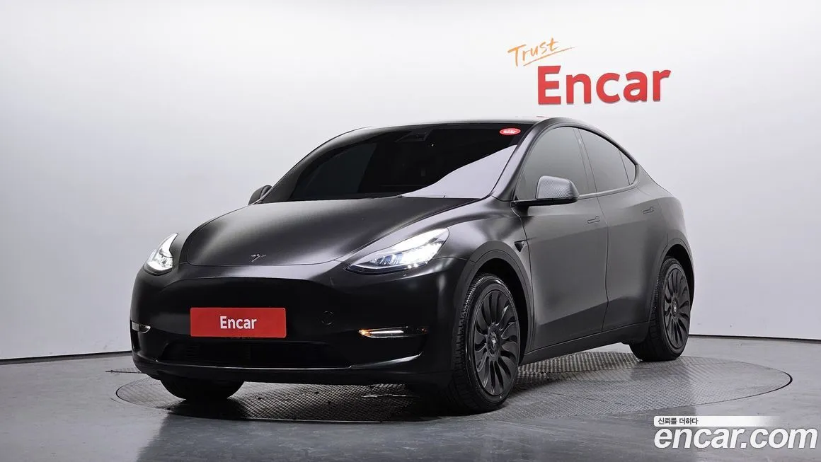 Tesla Model Y — фото 1
