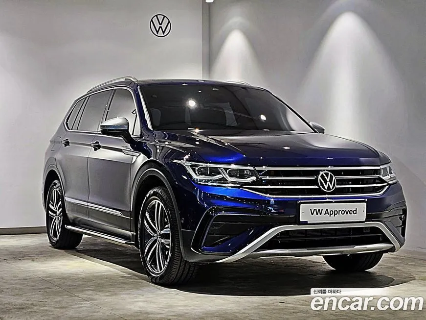 Volkswagen Tiguan — фото 1