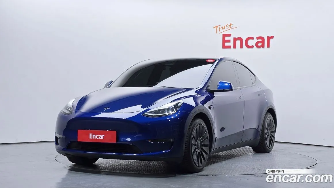 Tesla Model Y — фото 1