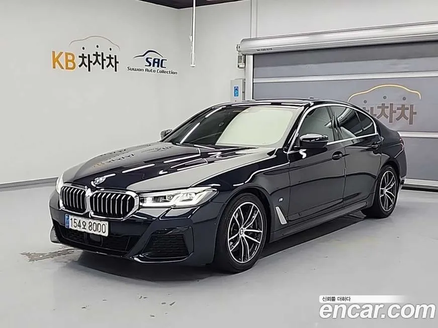 BMW 5-Series — фото 1