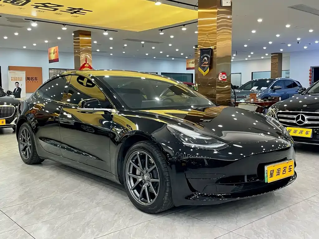 Tesla Model 3 — фото 10