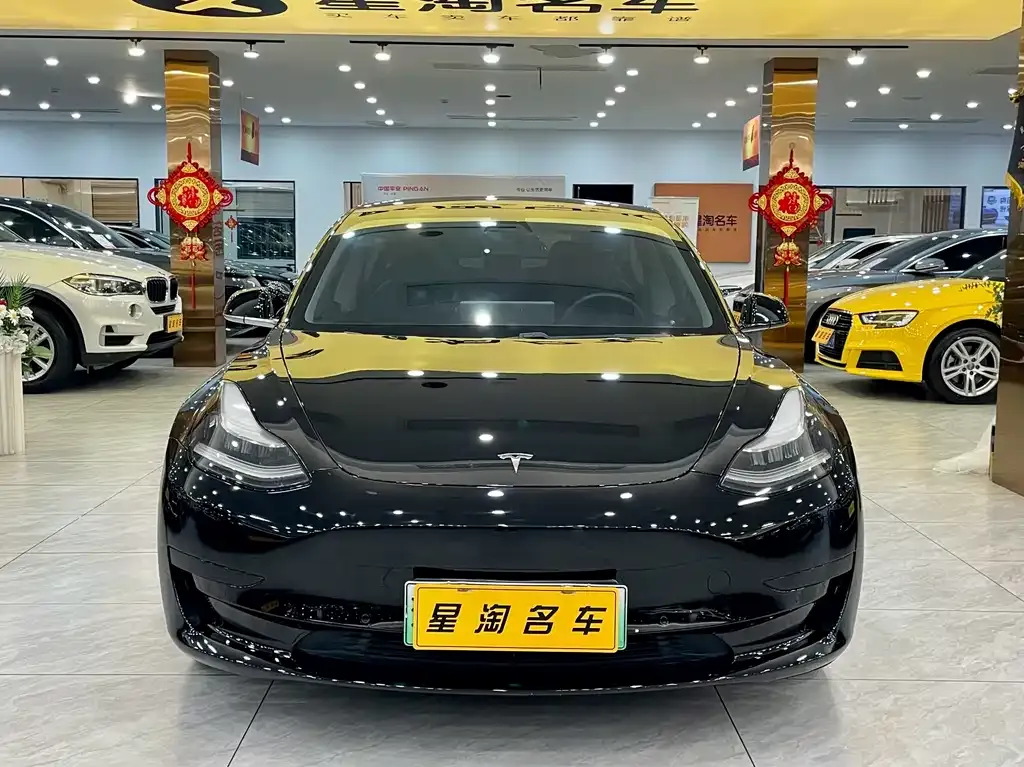 Tesla Model 3 — фото 7