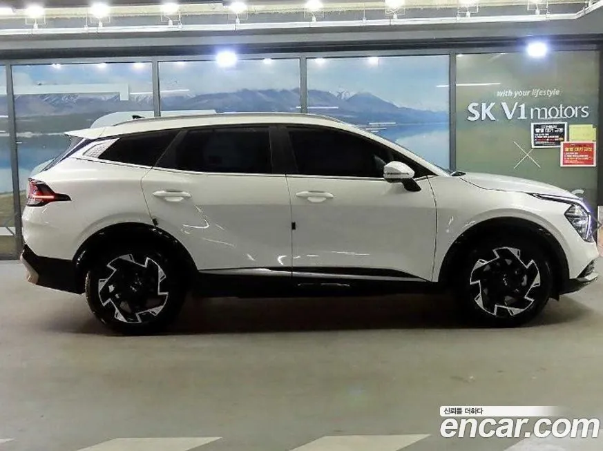Kia Sportage — фото 9