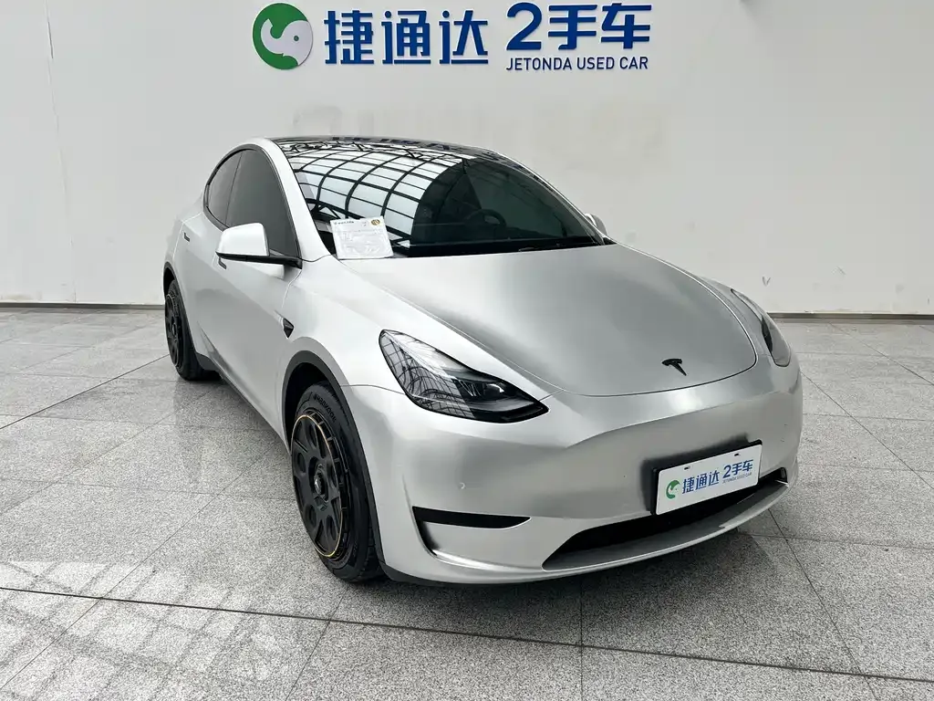 Tesla Model Y — фото 8
