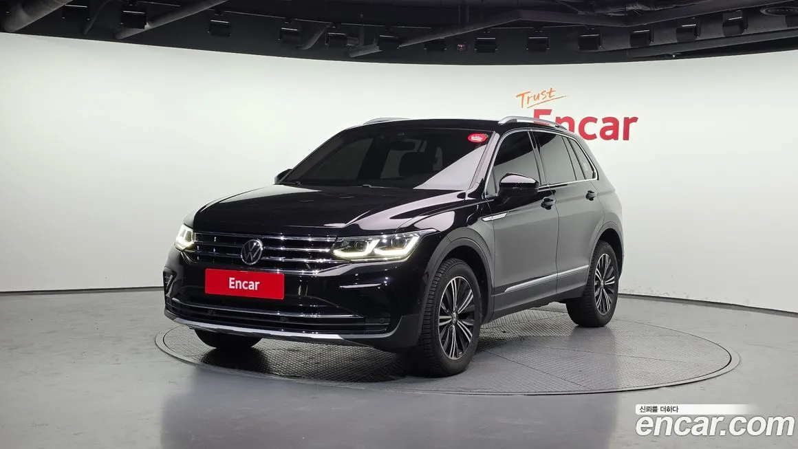 Volkswagen Tiguan — фото 1