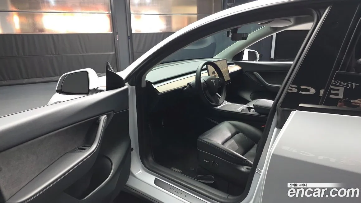 Tesla Model Y — фото 6
