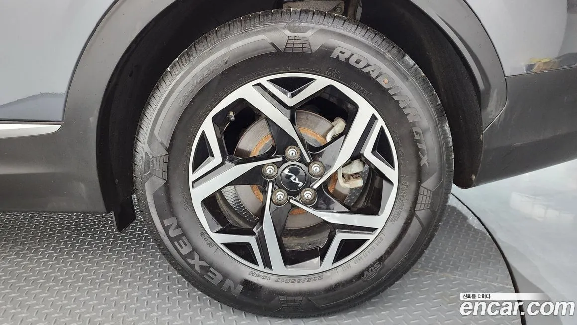 Kia Sportage — фото 10