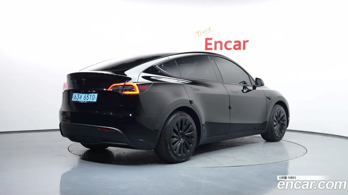 Tesla Model Y — фото 7