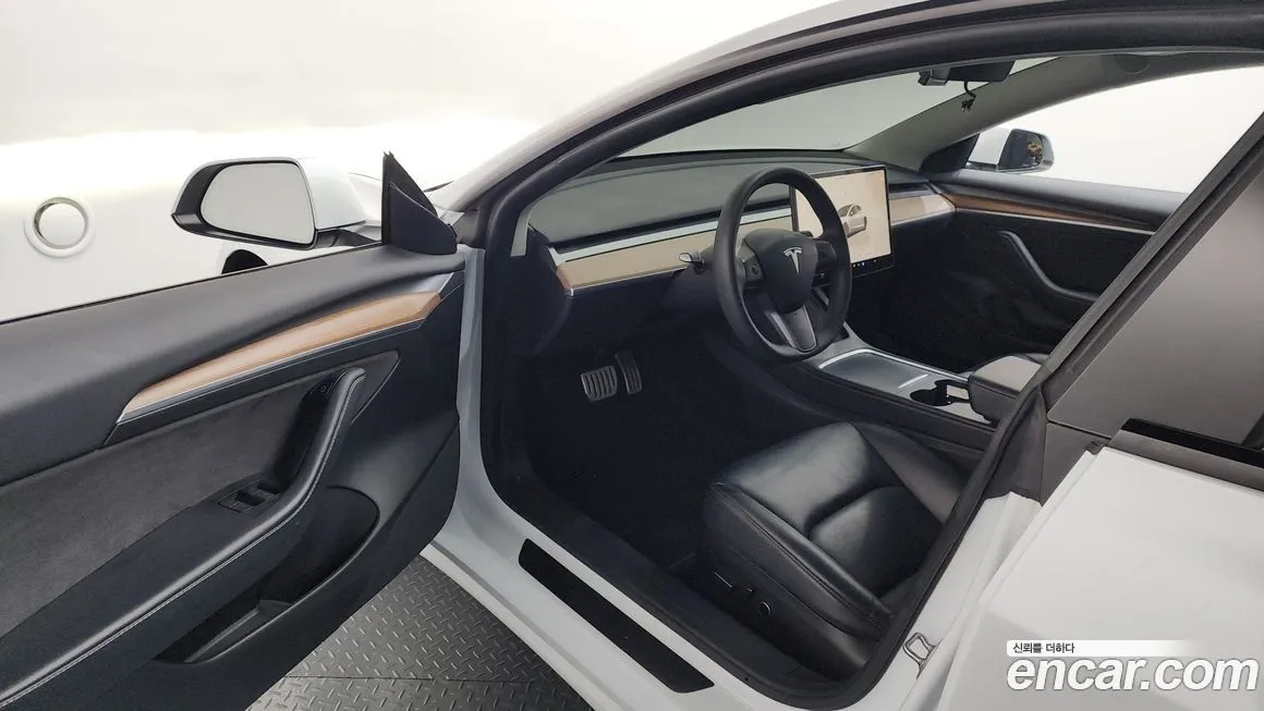 Tesla Model 3 — фото 9