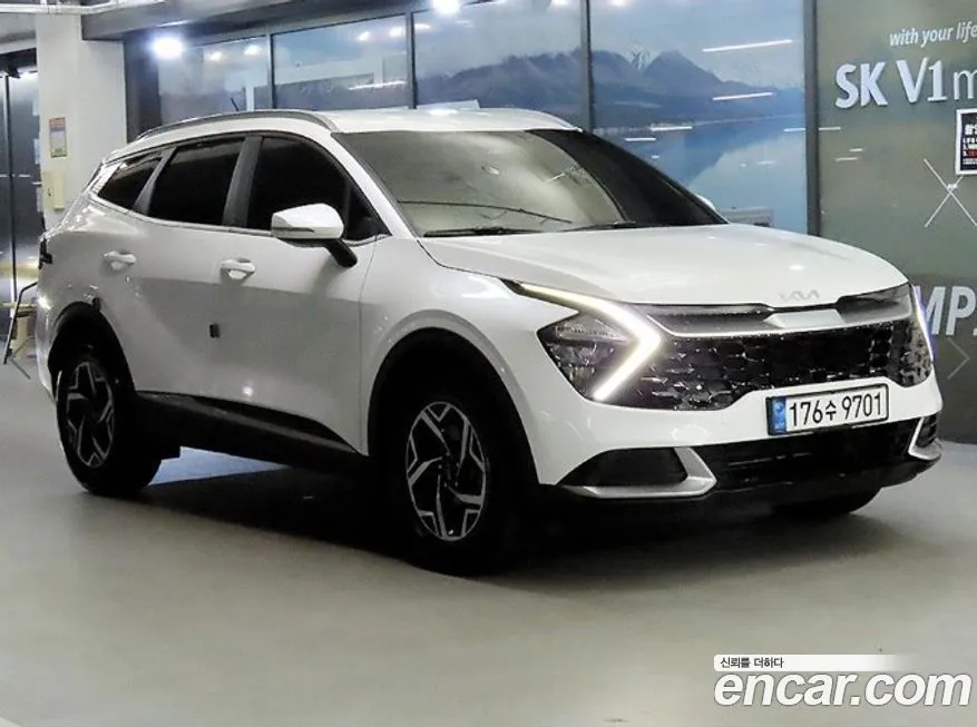 Kia Sportage — фото 1