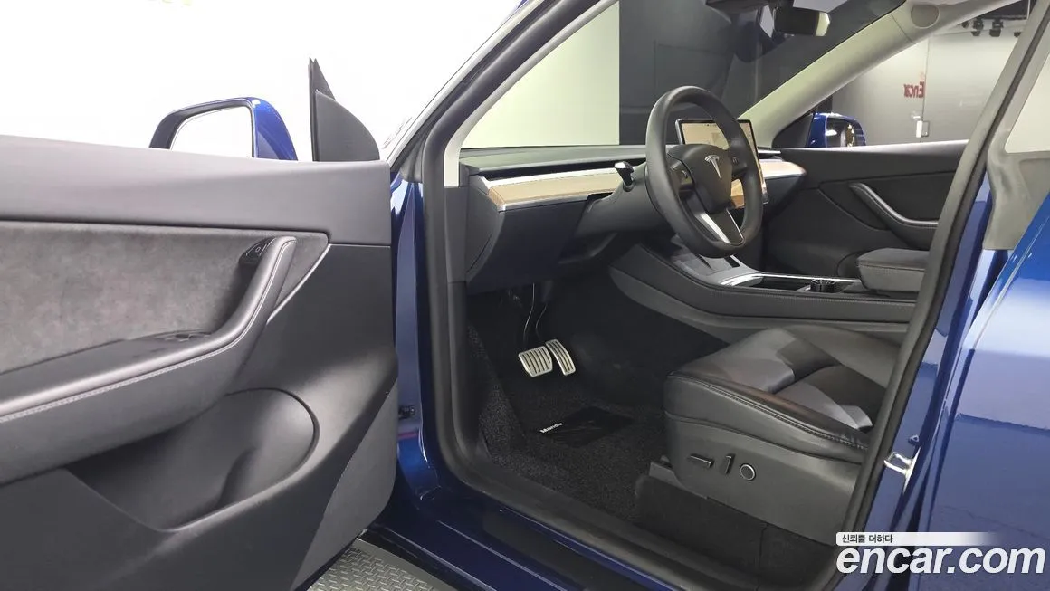 Tesla Model Y — фото 10