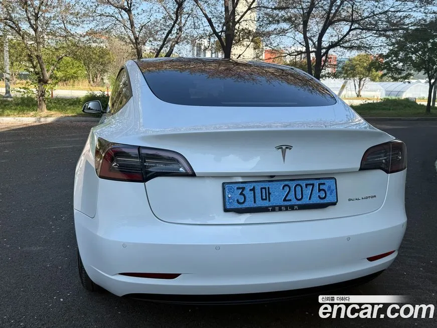 Tesla Model 3 — фото 7
