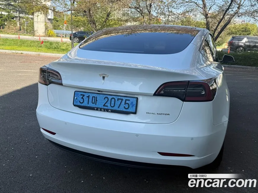 Tesla Model 3 — фото 10