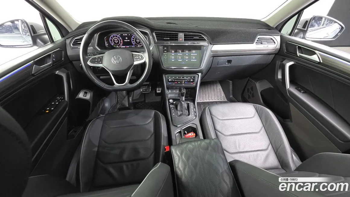Volkswagen Tiguan — фото 10