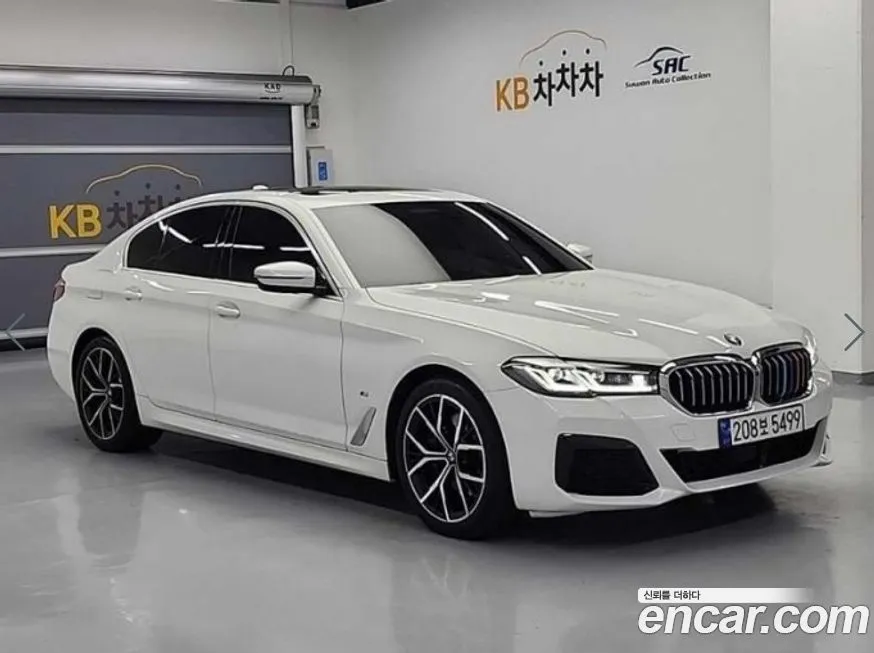 BMW 5-Series — фото 1