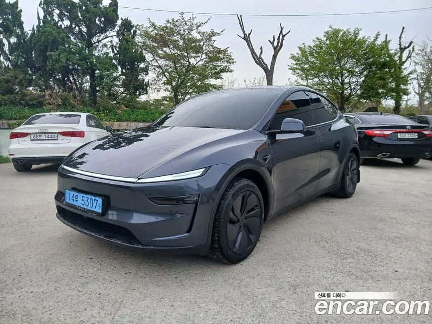 Tesla Model Y — фото 1