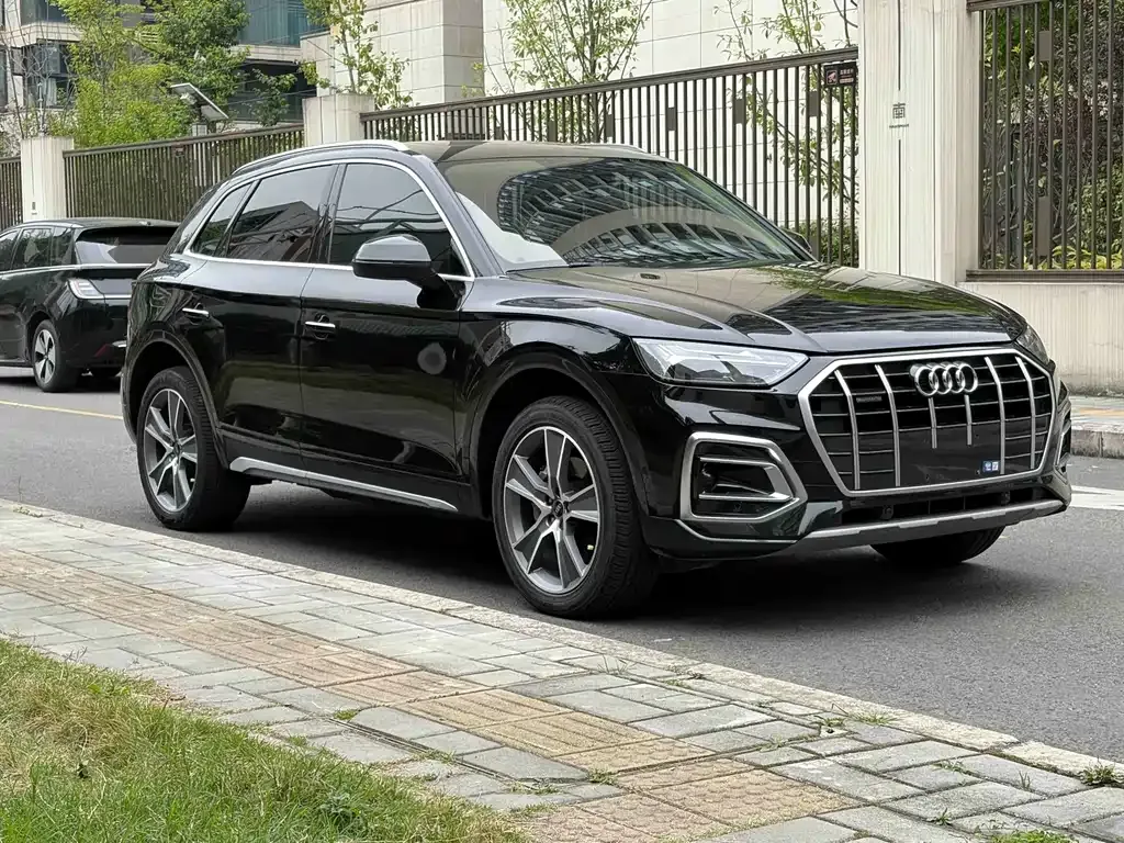 Audi Q5L — фото 6