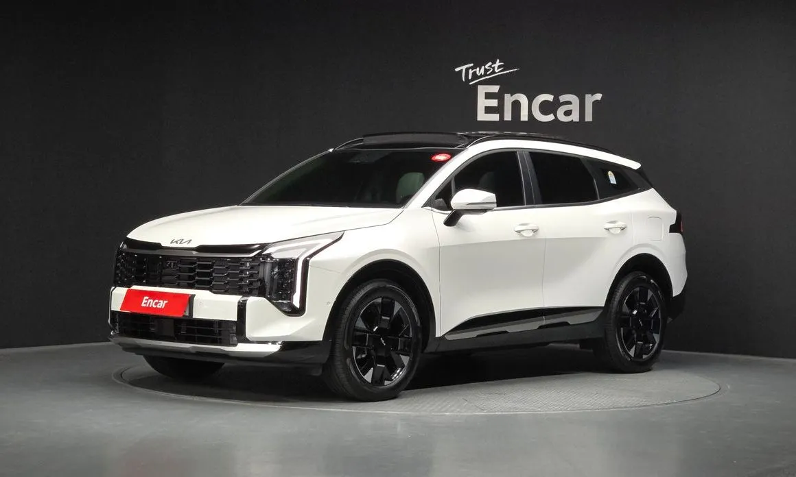Kia Sportage — фото 1