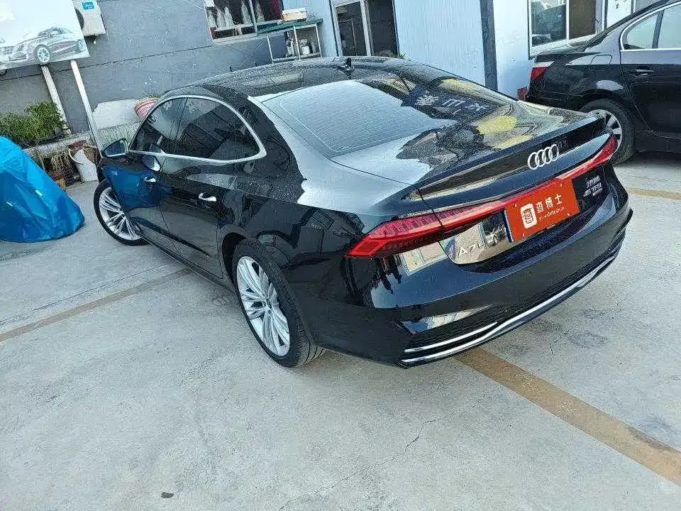 Audi A7L — фото 7