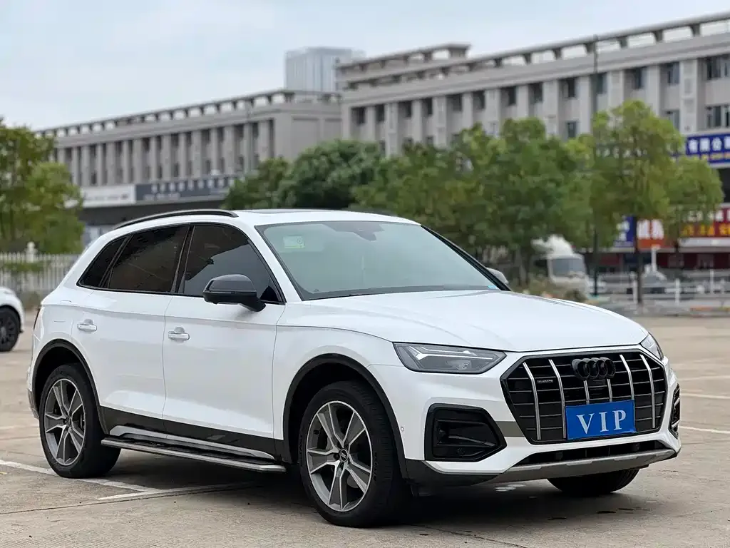 Audi Q5L — фото 6