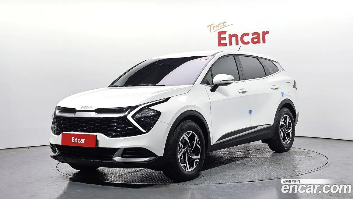 Kia Sportage — фото 1