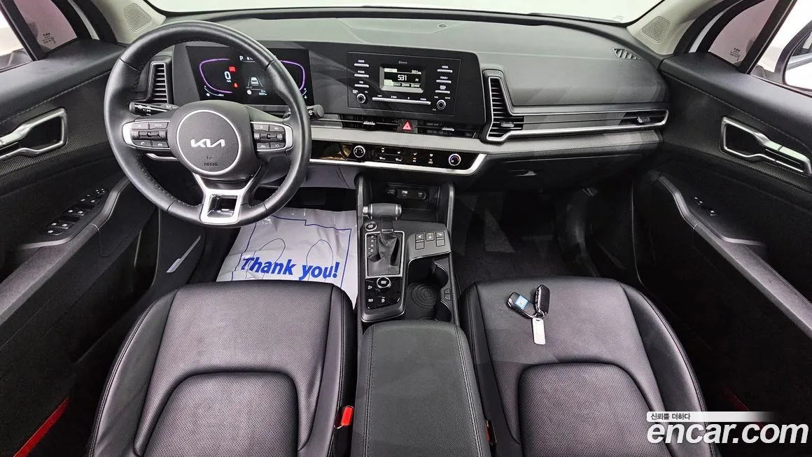 Kia Sportage — фото 9