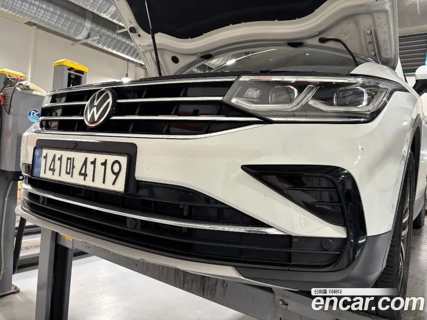 Volkswagen Tiguan — фото 1