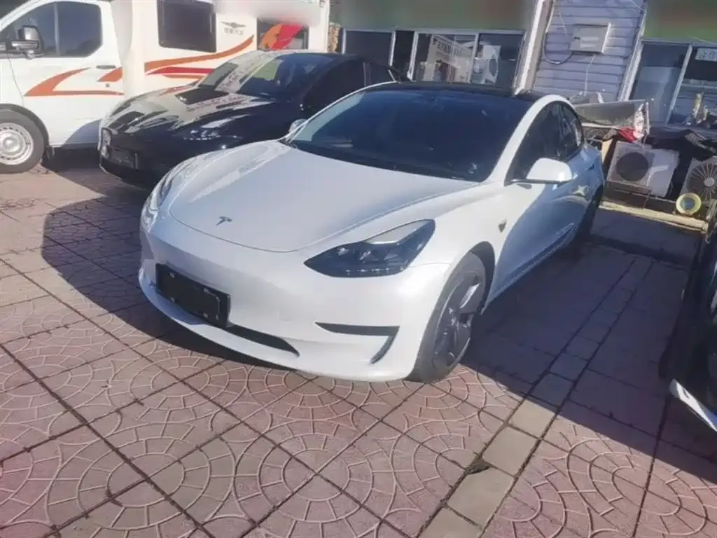 Tesla Model 3 — фото 5