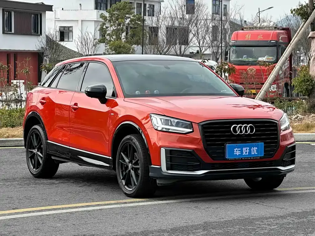 Audi Q2L — фото 5