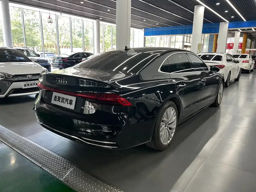 Audi A7L — фото 7