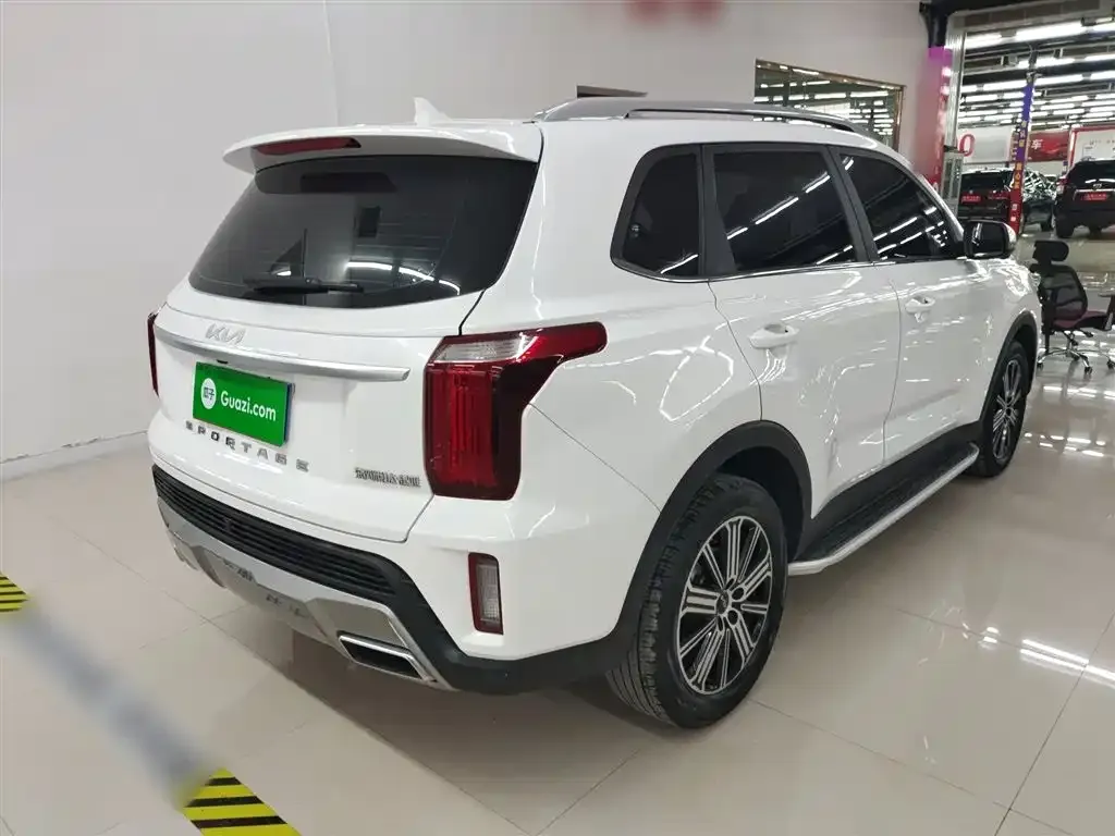 Kia Sportage — фото 9