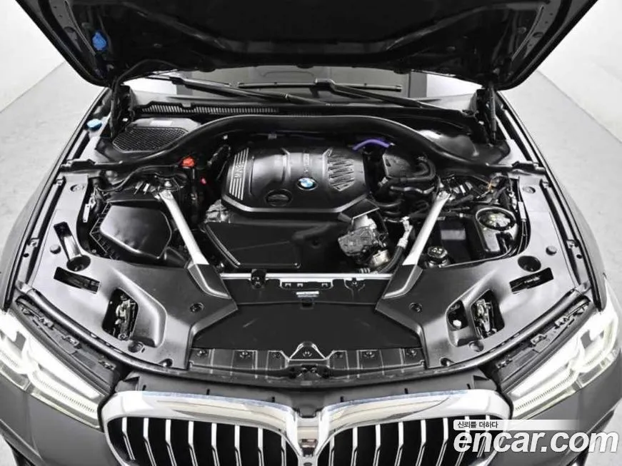 BMW 5-Series — фото 10