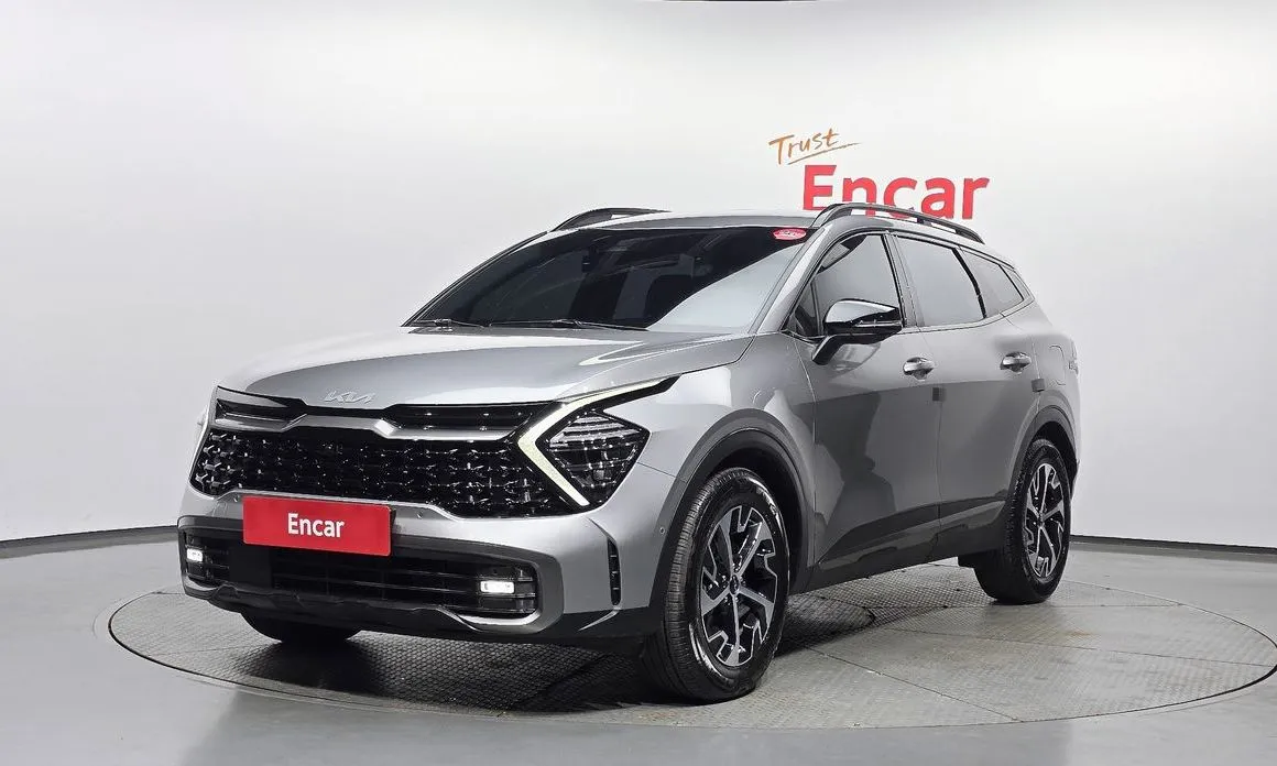 Kia Sportage — фото 1