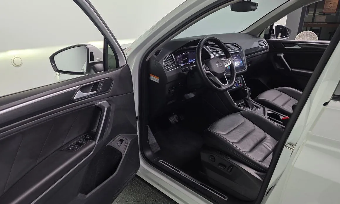 Volkswagen Tiguan — фото 7