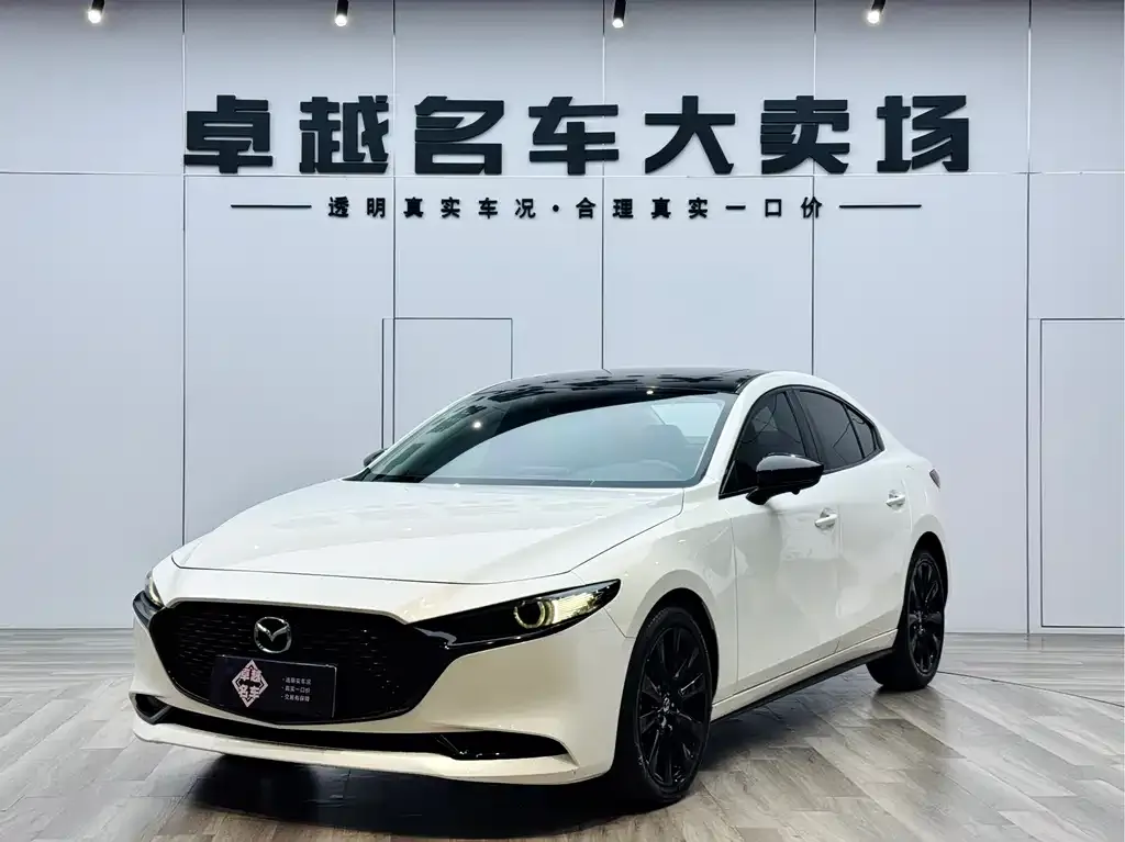 Mazda 3 Axela — фото 1